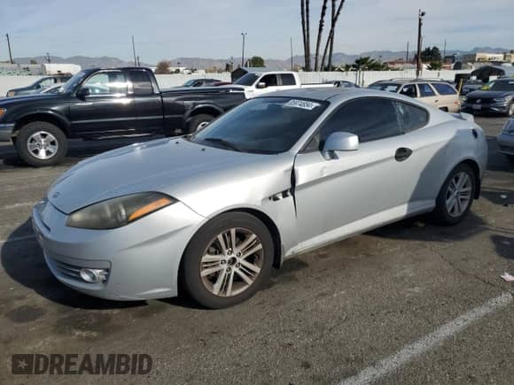 2008 Hyundai Tiburon GS с VIN KMHHM66DX8U291384, выставлен на аукционе Copart как лот 85974854 с пробегом 106 391 миль миль и Списание • Salvage title. История ставок и продаж доступна на DreamBid. Изображение 1.