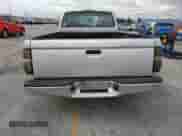 2002 Toyota Tacoma with VIN 5TENL42N82Z080549, listed as a Copart auction lot 80899715 with 115,239 mi miles and Salvage title. Bid and sale history available at DreamBid. Image 6.