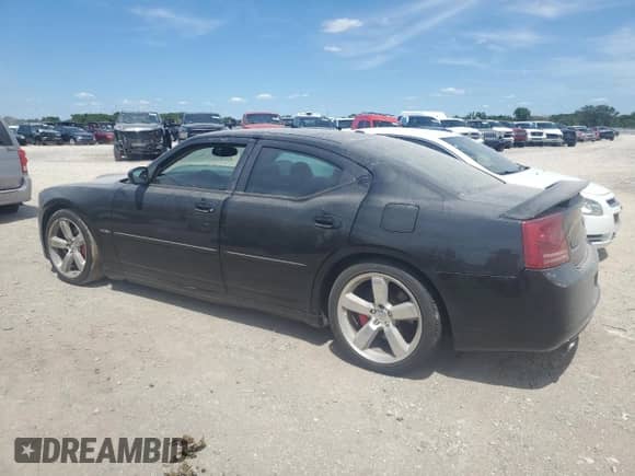 2006 Dodge Charger SRT-8 z VIN 2B3KA73W26H265877, wystawiony jako Copart lot #62549525 z przebiegiem 183 017 mil mil oraz Szkoda całkowita • Salvage title. Historia ofert i sprzedaży dostępna na DreamBid. Obrazek 2.