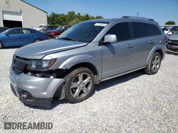 2017 Dodge Journey Crossroad with VIN 3C4PDCGG1HT705654, listed as a Copart auction lot 71744015 with 181,763 mi miles and Salvage title. Bid and sale history available at DreamBid. Image 1.