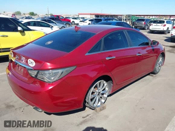 2013 Hyundai Sonata SE z VIN 5NPEC4ACXDH777372, wystawiony jako IAAI lot #43390082 z przebiegiem 107 207 mil mil oraz . Historia ofert i sprzedaży dostępna na DreamBid. Obrazek 4.
