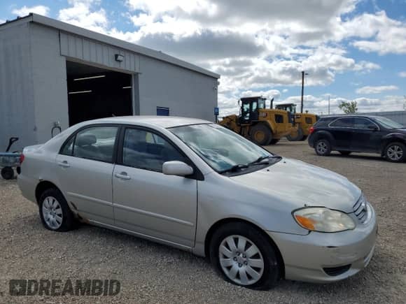 2003 Toyota Corolla CE with VIN 1NXBR32E33Z133028, listed as a Copart auction lot 71932545 with 220,264 mi miles and Clean title. Bid and sale history available at DreamBid. Image 4.