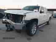 2013 GMC Sierra 1500 Denali z VIN 3GTP2XE24DG345268, wystawiony jako IAAI lot #43357777 z przebiegiem 168 765 mil mil oraz . Historia ofert i sprzedaży dostępna na DreamBid. Obrazek 2.