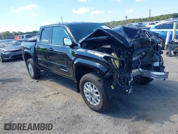 2024 Toyota Tacoma SR5 with VIN 3TMLB5JN7RM077957, listed as a IAAI auction lot 43149381 with 11,806 mi miles and . Bid and sale history available at DreamBid. Image 1.