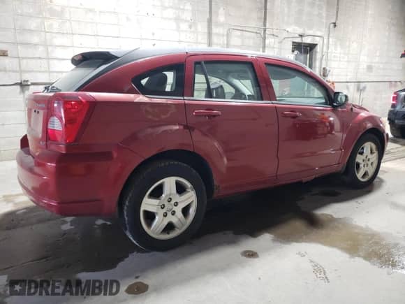 2009 Dodge Caliber SXT with VIN 1B3HB48A39D183841, listed as a Copart auction lot 84930845 with 199,267 mi miles and Clean title. Bid and sale history available at DreamBid. Image 3.