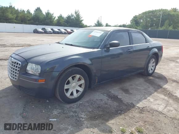 2008 Chrysler 300 LX with VIN 2C3KA43R28H224311, listed as a IAAI auction lot 43345755 with 255,683 mi miles and . Bid and sale history available at DreamBid. Image 2.