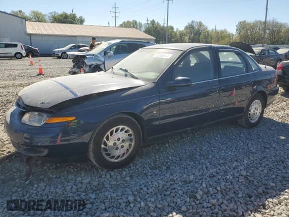 2000 Saturn LS with VIN 1G8JU52F7YY645498, listed as a Copart auction lot 75295614 with 140,554 mi miles and Salvage title. Bid and sale history available at DreamBid. Image 1.
