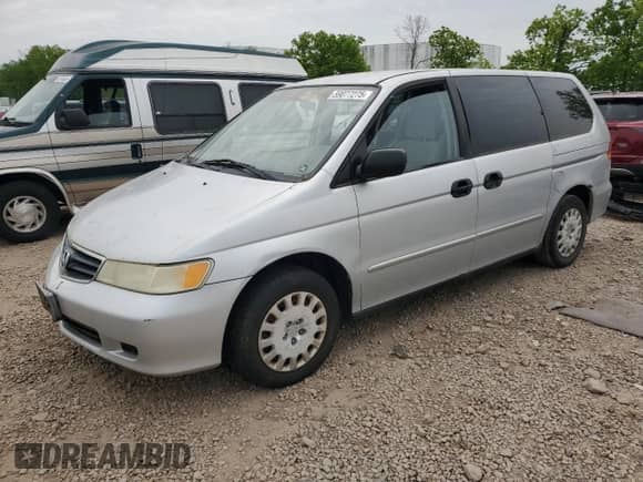 2002 Honda Odyssey LX с VIN 2HKRL18502H546808, выставлен на аукционе Copart как лот 59077275 с пробегом 302 111 миль миль и Чистый • Clean title. История ставок и продаж доступна на DreamBid. Изображение 1.
