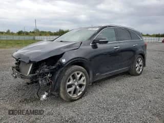 2016 Kia Sorento SXL z VIN 5XYPKDA52GG171203, wystawiony jako Copart lot #81302745 z przebiegiem 209 227 mil mil oraz Szkoda całkowita • Salvage title. Historia ofert i sprzedaży dostępna na DreamBid. Obrazek 1.