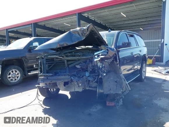 2017 Chevrolet Tahoe Premier with VIN 1GNSKCKC2HR305848, listed as a IAAI auction lot 42809925 with 105,623 mi miles and . Bid and sale history available at DreamBid. Image 6.