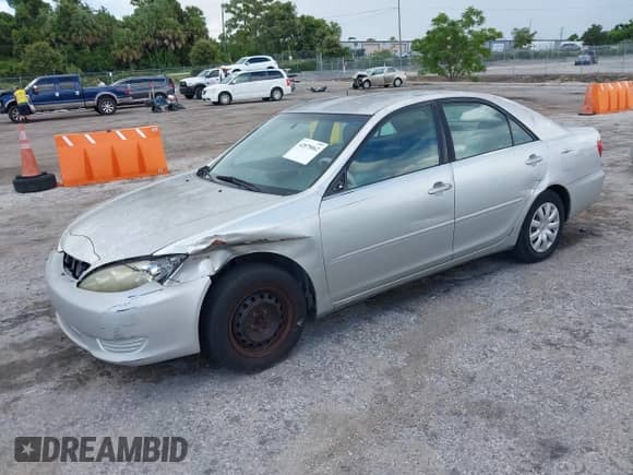 2005 Toyota Camry STD with VIN 4T1BE32K85U974198, listed as a IAAI auction lot 42879062 with 269,935 mi miles and . Bid and sale history available at DreamBid. Image 2.