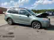 2016 Subaru Forester Touring with VIN JF2SJAXC1GH546735, listed as a Copart auction lot 80818985 with 116,913 mi miles and Salvage title. Bid and sale history available at DreamBid. Image 4.