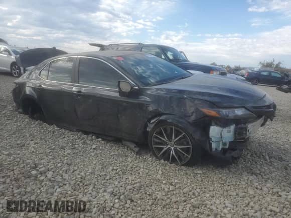 2023 Toyota Camry SE z VIN 4T1G11AK9PU742963, wystawiony jako Copart lot #82160895 z przebiegiem 83 141 mil mil oraz Szkoda całkowita • Salvage title. Historia ofert i sprzedaży dostępna na DreamBid. Obrazek 4.