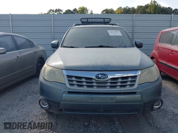 2012 Subaru Forester X Limited z VIN JF2SHBEC0CH420297, wystawiony jako IAAI lot #43180001 z przebiegiem 170 820 mil mil oraz . Historia ofert i sprzedaży dostępna na DreamBid. Obrazek 6.