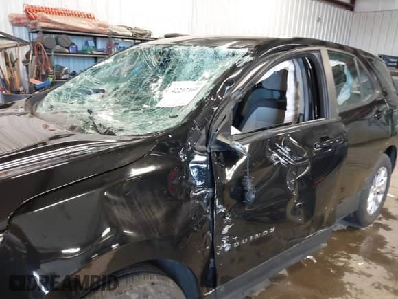 2020 Chevrolet Equinox LS z VIN 2GNAXSEV8L6181836, wystawiony jako IAAI lot #42297160 z przebiegiem 93 672 mil mil oraz . Historia ofert i sprzedaży dostępna na DreamBid. Obrazek 6.