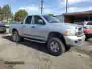 2005 Dodge 2500 SLT z VIN 1D7KS28D85J561964, wystawiony jako Copart lot #57527555 z przebiegiem 156 440 mil mil oraz Szkoda całkowita • Salvage title. Historia ofert i sprzedaży dostępna na DreamBid. Obrazek 4.