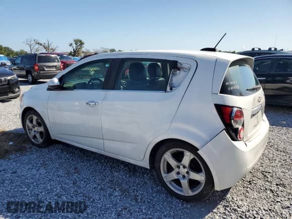 2016 Chevrolet Sonic LTZ с VIN 1G1JE6SB8G4144737, выставлен на аукционе Copart как лот 80409905 с пробегом 194 214 миль миль и Списание • Salvage title. История ставок и продаж доступна на DreamBid. Изображение 2.