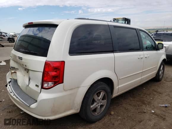 2013 Dodge Grand Caravan SXT with VIN 2C4RDGCG6DR575826, listed as a Copart auction lot 57378454 with 169,953 mi miles and Salvage title. Bid and sale history available at DreamBid. Image 3.