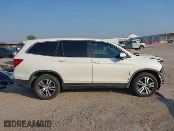 2016 Honda Pilot EX-L with VIN 5FNYF5H50GB015575, listed as a IAAI auction lot 43203296 with 183,086 mi miles and . Bid and sale history available at DreamBid. Image 14.