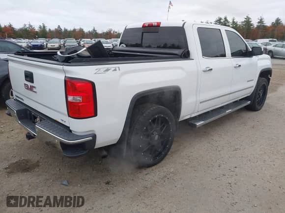 2015 GMC Sierra 1500 SLT z VIN 3GTU2VEC0FG391344, wystawiony jako IAAI lot #43515202 z przebiegiem 125 753 mil mil oraz . Historia ofert i sprzedaży dostępna na DreamBid. Obrazek 4.