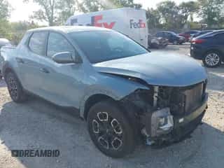 2022 Hyundai Santa Cruz SEL with VIN 5NTJBDAE2NH037157, listed as a IAAI auction lot 43158242 with 68,557 mi miles and . Bid and sale history available at DreamBid. Image 1.