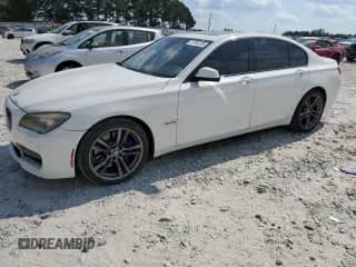 2011 BMW 7 Series 750i with VIN WBAKA8C54BCY36534, listed as a Copart auction lot 71793725 with 157,203 mi miles and Clean title. Bid and sale history available at DreamBid. Image 1.