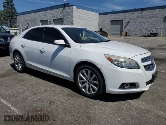 2013 Chevrolet Malibu LT with VIN 1G11E5SAXDF266985, listed as a Copart auction lot 50611835 with 141,636 mi miles and Clean title. Bid and sale history available at DreamBid. Image 4.