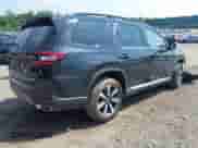 2024 Honda Pilot Touring with VIN 5FNYG1H77RB024994, listed as a IAAI auction lot 42672752 with 23,740 mi miles and . Bid and sale history available at DreamBid. Image 4.