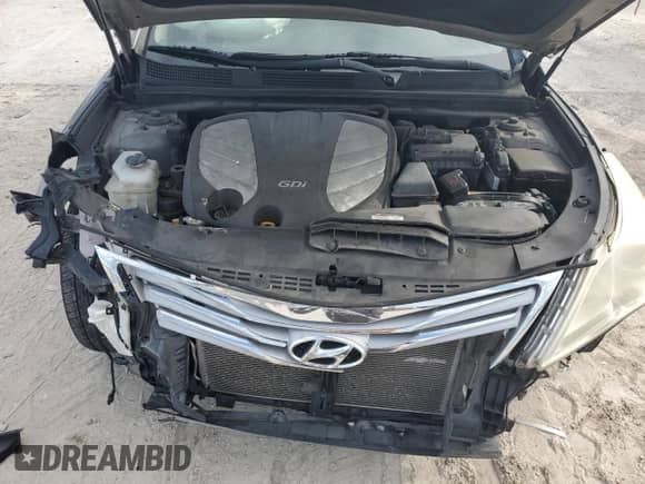 2012 Hyundai Azera z VIN KMHFH4JG1CA194151, wystawiony jako Copart lot #72110094 z przebiegiem 98 178 mil mil oraz Szkoda całkowita • Salvage title. Historia ofert i sprzedaży dostępna na DreamBid. Obrazek 12.