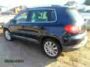 2011 Volkswagen Tiguan SE with VIN WVGAV7AX5BW512469, listed as a IAAI auction lot 42673142 with 165,159 mi miles and . Bid and sale history available at DreamBid. Image 3.