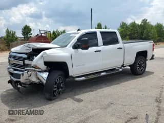 2016 Chevrolet Silverado 2500HD Work Truck z VIN 1GC1KUEG2GF242680, wystawiony jako Copart lot #63437825 z przebiegiem 100 927 mil mil oraz Szkoda całkowita • Salvage title. Historia ofert i sprzedaży dostępna na DreamBid. Obrazek 1.