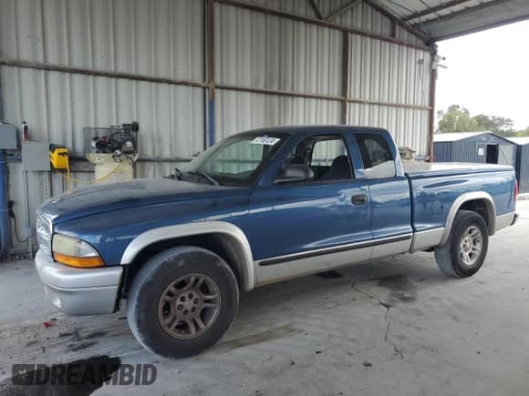 2004 Dodge Dakota SLT with VIN 1D7GL42N14S676687, listed as a Copart auction lot 72150124 with 162,913 mi miles and Salvage title. Bid and sale history available at DreamBid. Image 1.