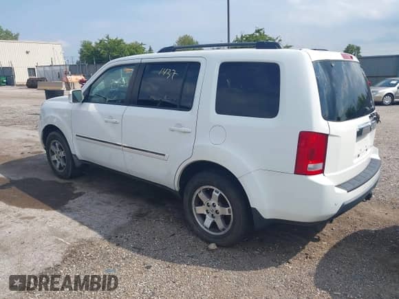 2009 Honda Pilot Touring with VIN 5FNYF489X9B016359, listed as a IAAI auction lot 43021437 with 288,269 mi miles and . Bid and sale history available at DreamBid. Image 3.