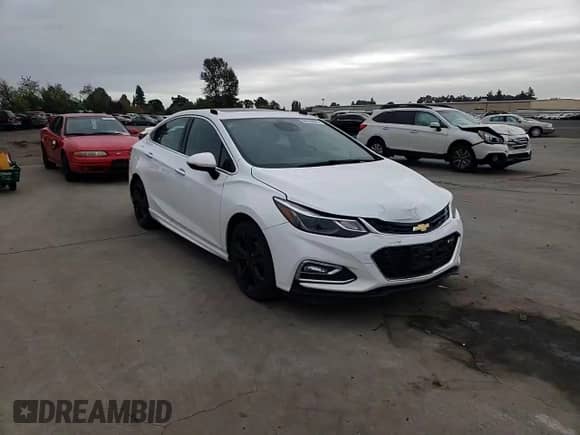 2018 Chevrolet Cruze Premier z VIN 1G1BF5SM5J7144326, wystawiony jako Copart lot #85756815 z przebiegiem 59 232 mil mil oraz Szkoda całkowita • Salvage title. Historia ofert i sprzedaży dostępna na DreamBid. Obrazek 13.