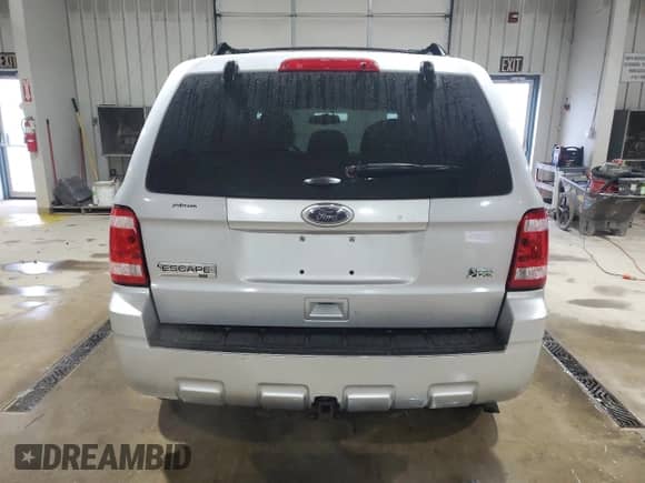 2011 Ford Escape XLT с VIN 1FMCU9DG9BKC35478, выставлен на аукционе Copart как лот 72022735 с пробегом 140 282 миль миль и Списание • Salvage title. История ставок и продаж доступна на DreamBid. Изображение 6.