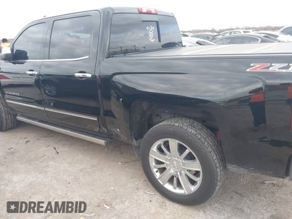 2017 Chevrolet Silverado 1500 LTZ z VIN 3GCUKSEJ0HG471081, wystawiony jako IAAI lot #41126259 z przebiegiem 40 551 mil mil oraz . Historia ofert i sprzedaży dostępna na DreamBid. Obrazek 6.