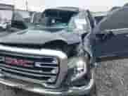 2021 GMC Sierra 1500 SLT with VIN 3GTU9DED9MG191347, listed as a IAAI auction lot 42918432 with 142,464 mi miles and . Bid and sale history available at DreamBid. Image 6.