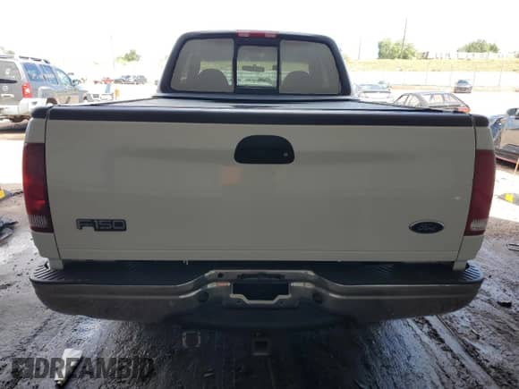 2000 Ford F-150 XL z VIN 1FTRX17L7YNB93206, wystawiony jako Copart lot #70413045 z przebiegiem 386 558 mil mil oraz Szkoda całkowita • Salvage title. Historia ofert i sprzedaży dostępna na DreamBid. Obrazek 6.