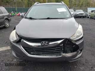 2015 Hyundai Tucson SE z VIN KM8JUCAG9FU028253, wystawiony jako IAAI lot #43440332 z przebiegiem 179 948 mil mil oraz . Historia ofert i sprzedaży dostępna na DreamBid. Obrazek 6.