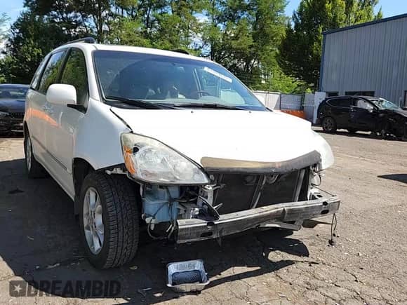 2004 Toyota Sienna XLE z VIN 5TDBA22C84S022517, wystawiony jako Copart lot #63709835 z przebiegiem 183 060 mil mil oraz Szkoda całkowita • Salvage title. Historia ofert i sprzedaży dostępna na DreamBid. Obrazek 14.