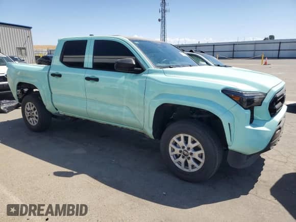 2024 Toyota Tacoma SR with VIN 3TYKD5HNXRT000886, listed as a Copart auction lot 66936505 with 21,648 mi miles and Salvage title. Bid and sale history available at DreamBid. Image 4.