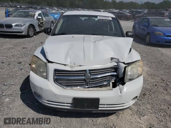 2011 Dodge Caliber Heat with VIN 1B3CB5HA9BD214435, listed as a Copart auction lot 64458005 with 138,749 mi miles and Salvage title. Bid and sale history available at DreamBid. Image 5.