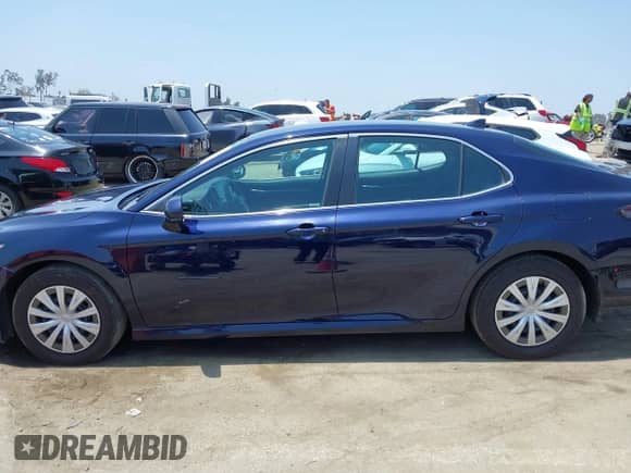 2022 Toyota Camry Hybrid LE with VIN 4T1C31AK0NU576130, listed as a IAAI auction lot 42382718 with 70,749 mi miles and . Bid and sale history available at DreamBid. Image 14.