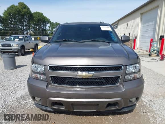 2011 Chevrolet Suburban LT z VIN 1GNSCJE09BR344091, wystawiony jako IAAI lot #43487649 z przebiegiem 182 652 mil mil oraz . Historia ofert i sprzedaży dostępna na DreamBid. Obrazek 6.