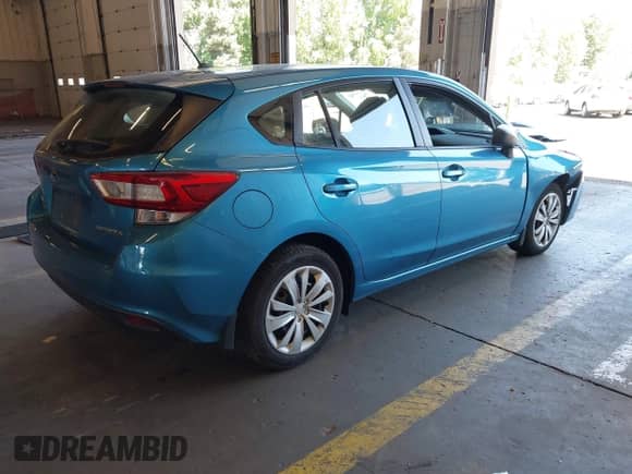 2018 Subaru Impreza z VIN 4S3GTAA6XJ3714054, wystawiony jako IAAI lot #42964905 z przebiegiem 45 880 mil mil oraz . Historia ofert i sprzedaży dostępna na DreamBid. Obrazek 4.