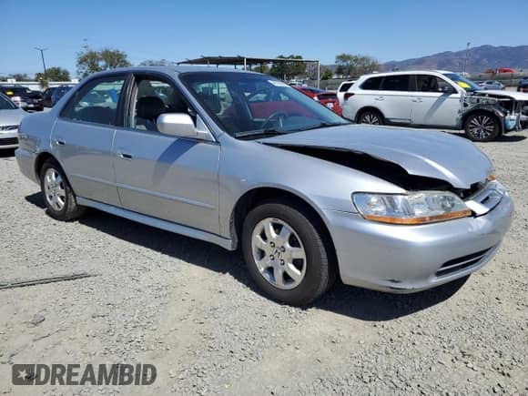 2002 Honda Accord EX with VIN JHMCG66012C021216, listed as a Copart auction lot 48795965 with 257,025 mi miles and Salvage title. Bid and sale history available at DreamBid. Image 4.