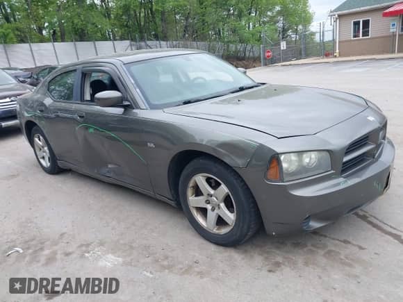 2010 Dodge Charger 3.5L with VIN 2B3CA2CV0AH251239, listed as a IAAI auction lot 42244252 with 168,138 mi miles and . Bid and sale history available at DreamBid. Image 1.