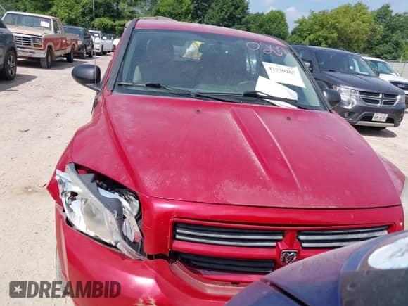 2011 Dodge Caliber z VIN 1B3CB1HA7BD209131, wystawiony jako IAAI lot #42730267 z przebiegiem 114 581 mil mil oraz . Historia ofert i sprzedaży dostępna na DreamBid. Obrazek 12.