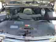 2004 Chevrolet Suburban LT z VIN 1GNFK16Z94J156657, wystawiony jako Copart lot #74087664 z przebiegiem 267 416 mil mil oraz Szkoda całkowita • Salvage title. Historia ofert i sprzedaży dostępna na DreamBid. Obrazek 12.