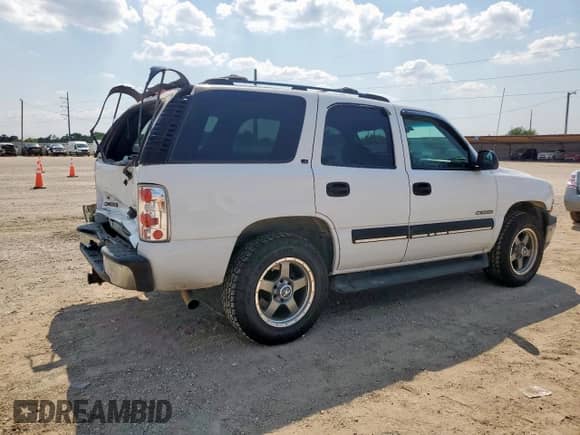 2001 Chevrolet Tahoe LS с VIN 1GNEC13T51R164809, выставлен на аукционе Copart как лот 70288725 с пробегом 232 583 миль миль и Списание • Salvage title. История ставок и продаж доступна на DreamBid. Изображение 3.